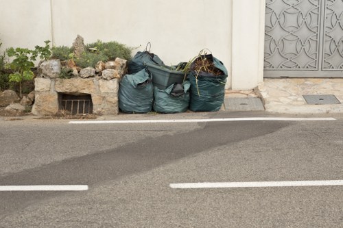 Crew preparing to load a shed and garden waste for man and van removal